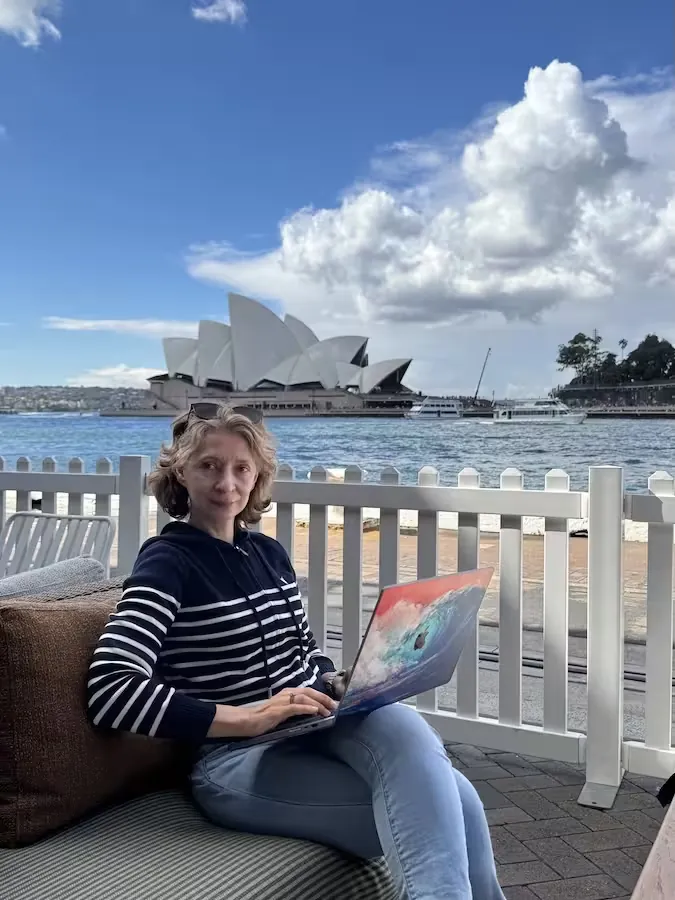 Inga on her Macbook Working in Sydney on Pressific and Tech Generation Projects