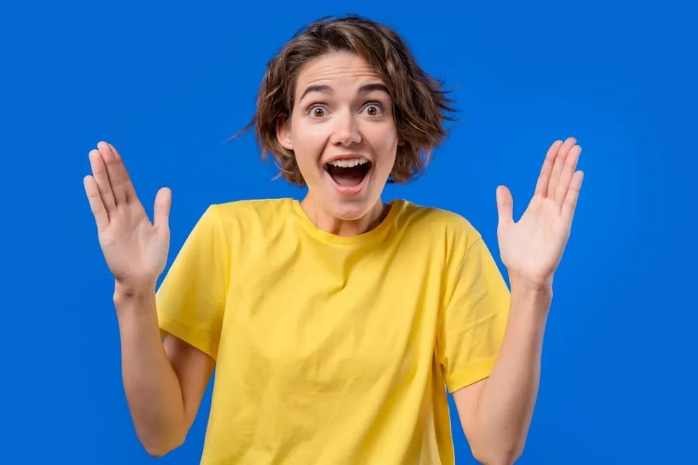 Woman showing invisible abstract subject or object sizes. Size matters
