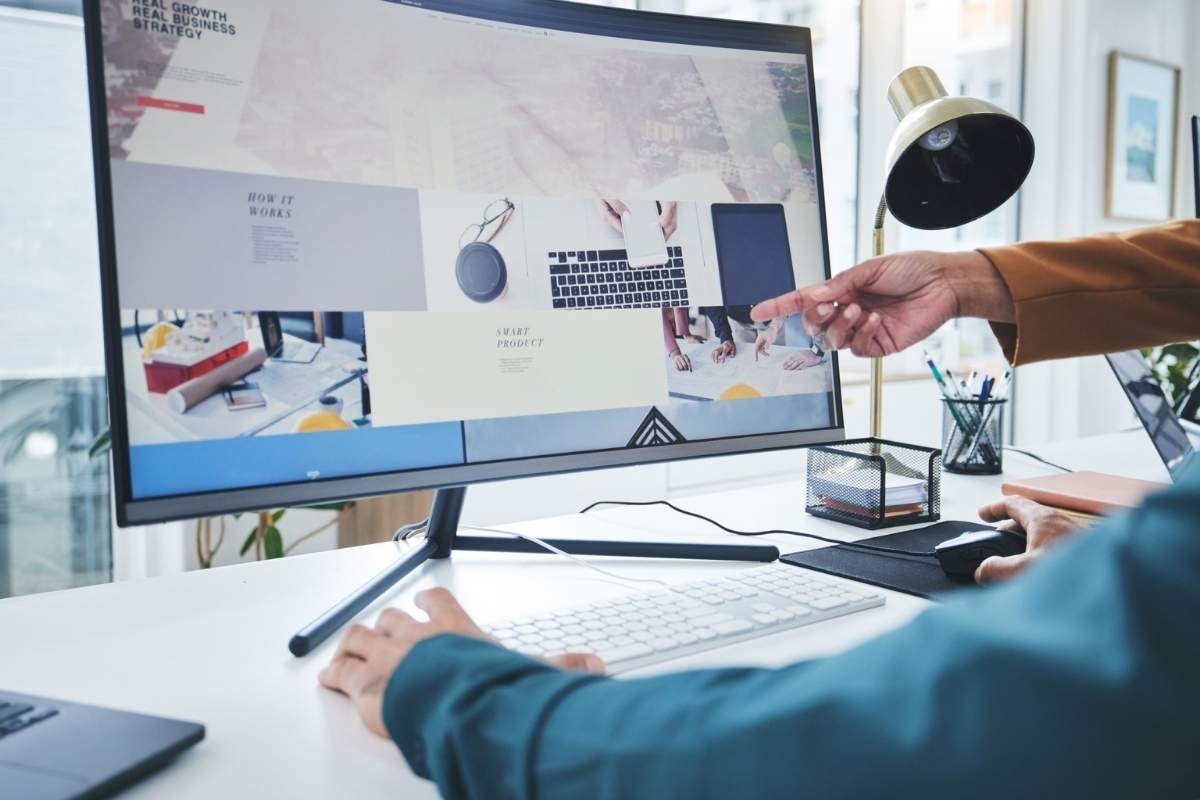 Web Design: What Makes a Good Website for Businesses 1 hands teamwork and computer for training coachin 2026 01 09 09 42 07 utc scaled 1